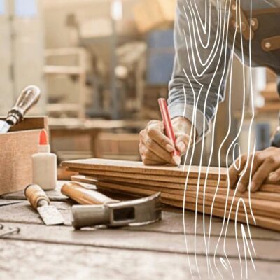 Stolarz Grajewo precyzyjnie pracuje nad projektem w warsztacie.